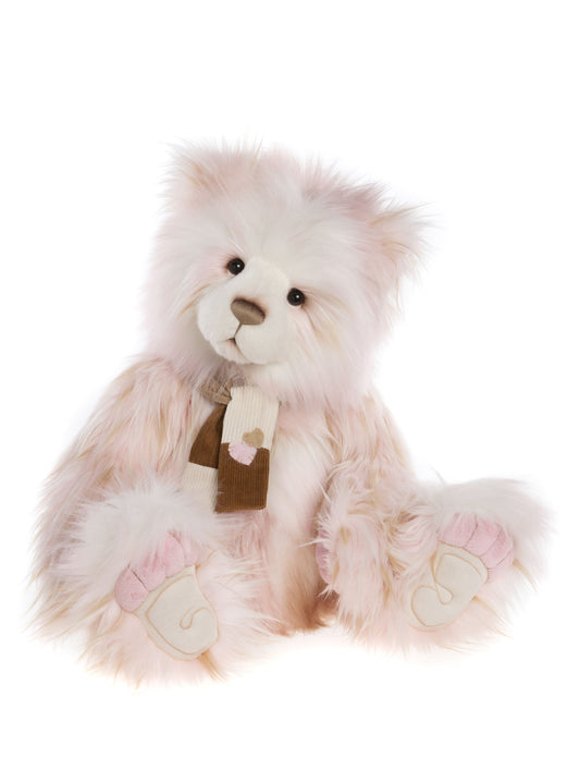 Large pink Charlie Bear plush wearing scarf with heart design
