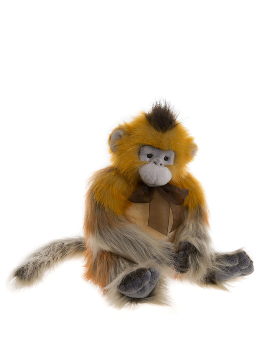 2019 Charlie Bear Fiddy monkey with soft long fur in shades of yellow and gray.